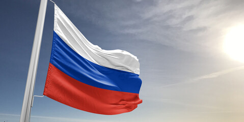 Russia national flag cloth fabric waving on beautiful sky grey Background.