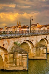 Macon, France - 6/9/2015:  The historic Saint-Laurent Bridge over the Soane river.  It was among...