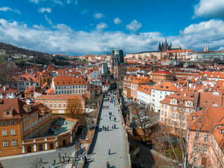 Obraz premium Scenic spring panoramic aerial view of the Old Town pier architecture and Charles Bridge over Vltava river in Prague, Czech Republic