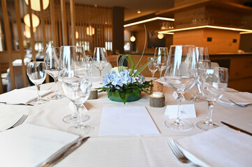 Table set in soft pink and white for wedding or event party. Luxury decoration