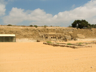 Caesarea Amphitheater in Caesarea National Park, which was originally built by King Herod and today is a famous archaeological site in Israel.  Image has copy space.