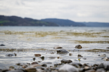 Fototapeta na wymiar stones at a lake