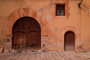 An ancient house doors in old town, Spain