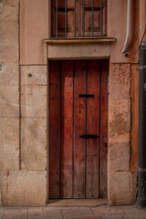An ancient house doors in old town, Spain