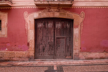 An ancient house doors in old town, Spain