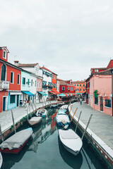 Fototapeta na wymiar Italian Canal with Buildings and Boats