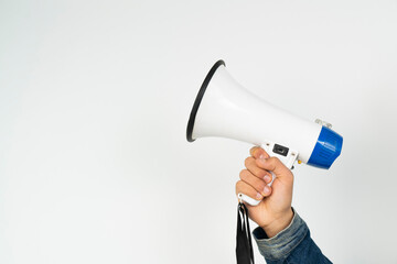 Cropped Hand Of Man Holding Megaphone