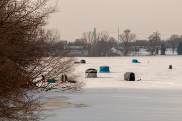 Ice Fishing Shanties On Fox River In De Pere, Wisconsin, In February