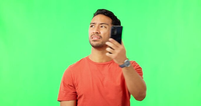 Error, connection and phone call by man in green screen studio with problem, internet and delay on mockup background. Smartphone, issue and confused mexican guy annoyed with 404, glitch or bad signal
