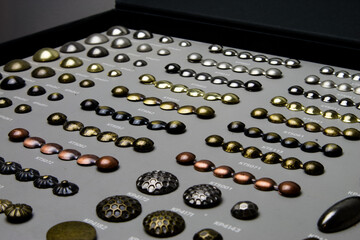 A set of decorative nails for furniture.  Vintage rivets and studs.
