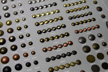 A set of decorative nails for furniture.  Vintage rivets and studs.
