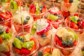 Fresh fruit juice Kiwi, Melons, Mango, Passion,  on ice at the market