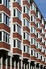 row of many bay windows of rental houses in the city center of cologne