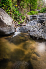 Fototapeta na wymiar Khlong Nam Lai Waterfall, Beautiful waterfalls in klong Lan national park of Thailand