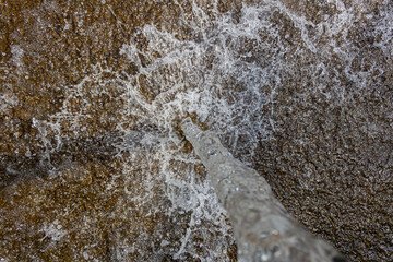 water flowing into the water