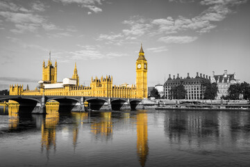 Big Ben and British parliament in yellow isolated on black and white 
