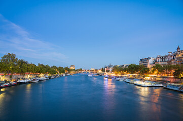 Fototapeta na wymiar Night time view Paris with Seine river canal