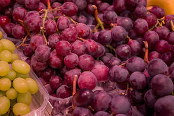 Red grapes at a farmer s market.