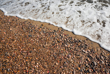 Sea pebbles. Small stones gravel texture background.