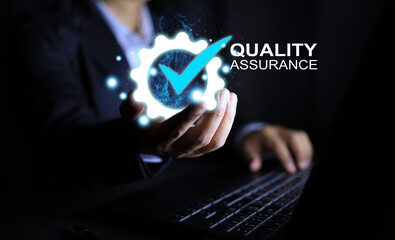 Officers or auditors hold quality marks certification ready to be presented to factory entrepreneurs confirm the quality of the product and trust customers with quality assurance warranty sign.