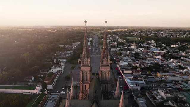 4k sunset over the city, church, lujan, buenos aires, argentina