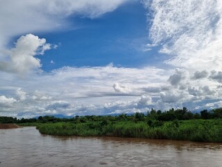 Beautiful blue sky in fluffy  Soft white clouds and the Ping River