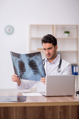 Young male doctor radiologist working in the clinic