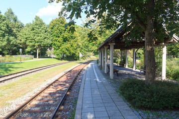 Fototapeta na wymiar Train station in spa park Kurpark in municipality Bodenmais in Bavarian Forest, Germany