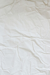 White crumpled paper texture seamless background