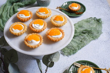 pie with whipped cream and oranges
