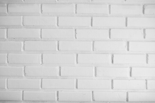 White brick wall patterned texture for background luxurious design concept. © Charlie's