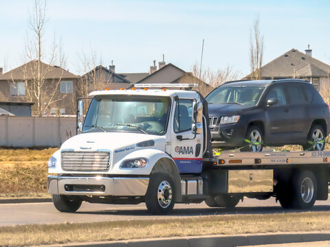 Calgary, Alberta, Canada. Apr 15, 2023. An AMA Alberta Motor Association Car Assistance towing.