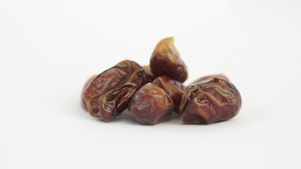 dried dates on a white background