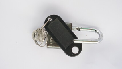 lock and key on white