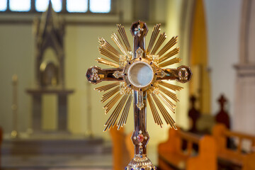 Monstrance, also called a Ostensorium in which the consecrated eucharistic host is held - obrazy, fototapety, plakaty
