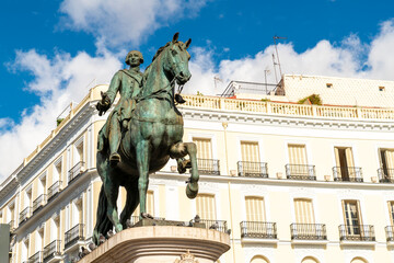 Statue of Carlos the III at Puerta del sol in Madrid Spain - obrazy, fototapety, plakaty