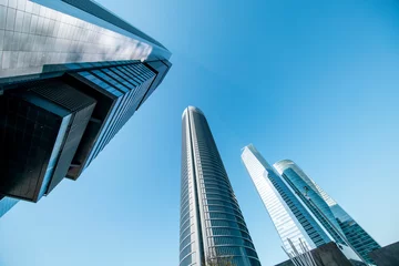Papier Peint photo autocollant Madrid Cuatro Torres Business Area in Madrid with blue sky, spain
