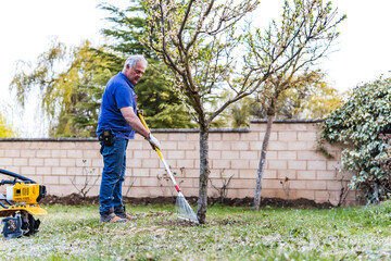stock photo of man working in the garden