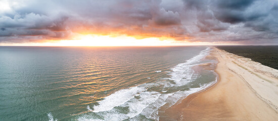 Aerial panorama above the beaches of Charente Maritime during a superb sunset