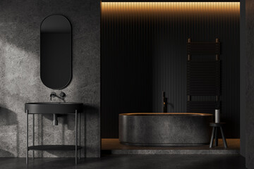 Dark bathroom interior with sink, bathtub with accessories and rail ladder © ImageFlow