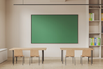 Beige classroom interior with blackboard