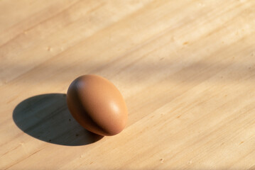 brown eggs on wooden table
