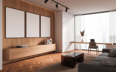 Modern living room interior with couch and workplace near window. Mock up frames