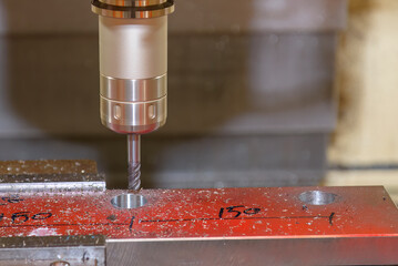 The CNC milling machine cutting injection mold part by solid ball end mill tool.