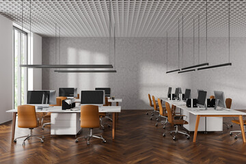 Light office coworking interior with pc computer in row, panoramic window