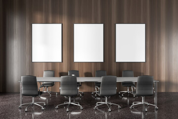 Dark wooden office meeting room with posters