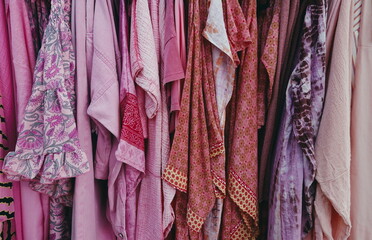 Fototapeta premium Pink Textile Fabric Dresses Clothes Shop in Israel