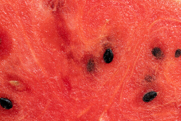 Ripe red watermelon with black seeds