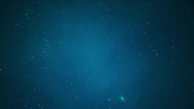 Comet C/2022 E3 (ztf) Shines Bright Green Color In Dark Night Starry Sky. Comet At A Distance Of 170 Million Kilometers.