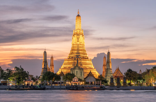 Wat Arun temple in Bangkok illuminated at sunset